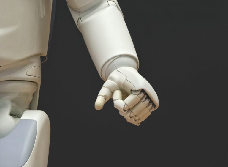 Robotic hand reaching out, representing AI automation